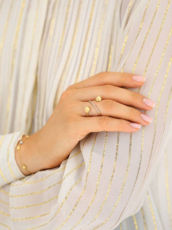 Nanis Anello ad incrocio "DANCING ÉLITE" con boules incise a mano in oro e d – Nanis Italian Jewels Novità