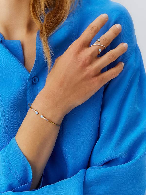 Nanis Anello ad incrocio "DANCING AZURE" in oro, diamanti e acquamarina – Nanis Italian Jewels Online