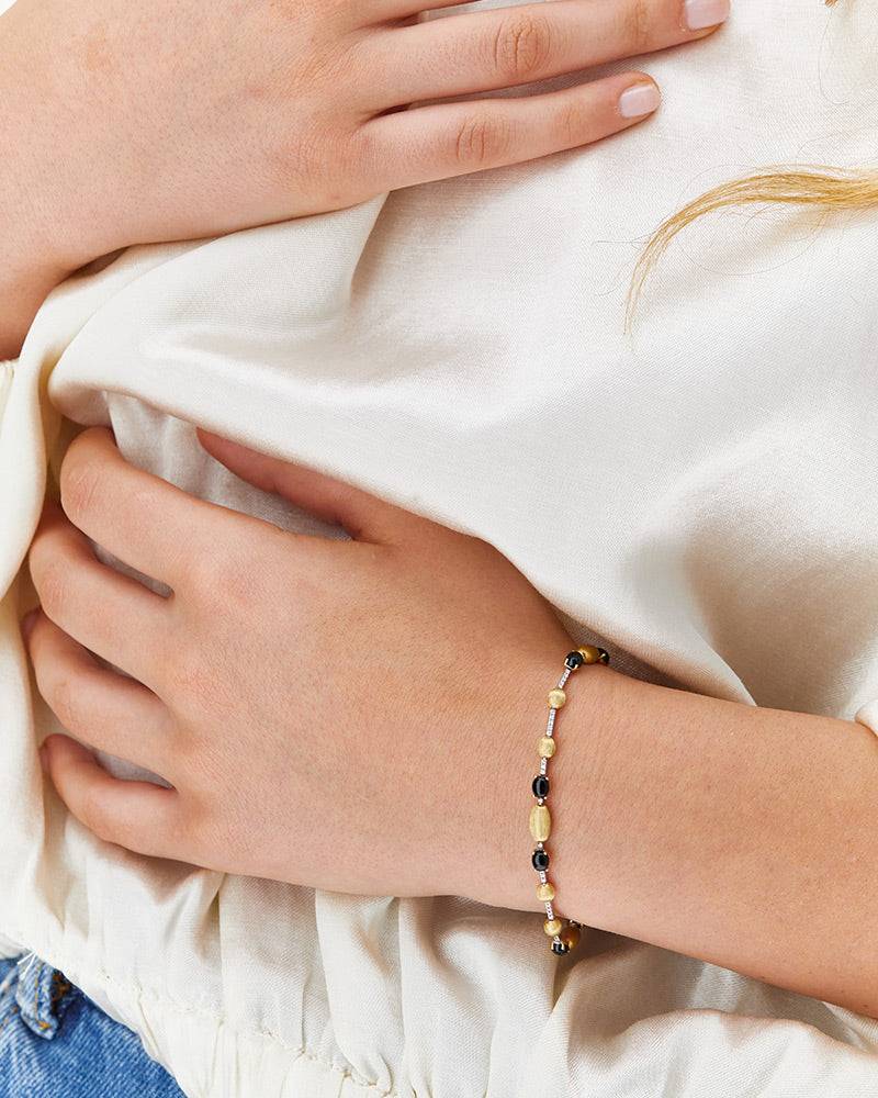 Nanis Bracciale tennis "DANCING MYSTERY BLACK" in oro, diamanti e onice nero – Nanis Italian Jewels Qualità Garantita