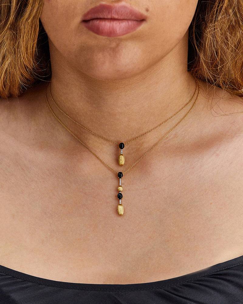 Nanis Collana "DANCING MYSTERY BLACK" pendente in oro, diamanti e onice nero – Nanis Italian Jewels Prezzo Ridotto